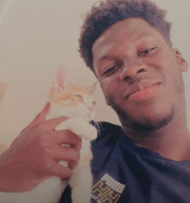 Yunus Musah with his cat Bronx